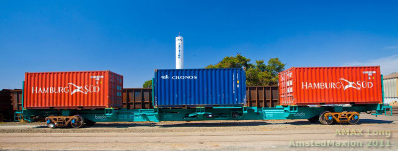 Vista lateral do vagão AMAX Long da AmstedMaxion para transporte de containers da Brado Logística